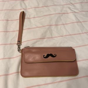 Pink wristlet with mustache